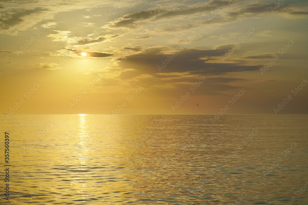 Golden sunset sea background.