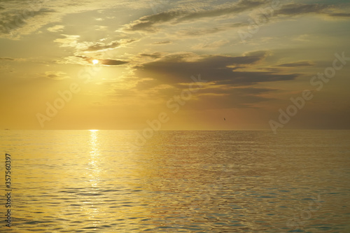 Golden sunset sea background. © GIS