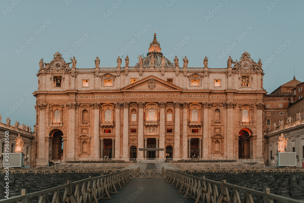 Obraz premium Historic facade of the basilica of St. Peter in Rome, Italy with Vatican city. Famous Saint Peter's Square in Vatican, made in 1506.