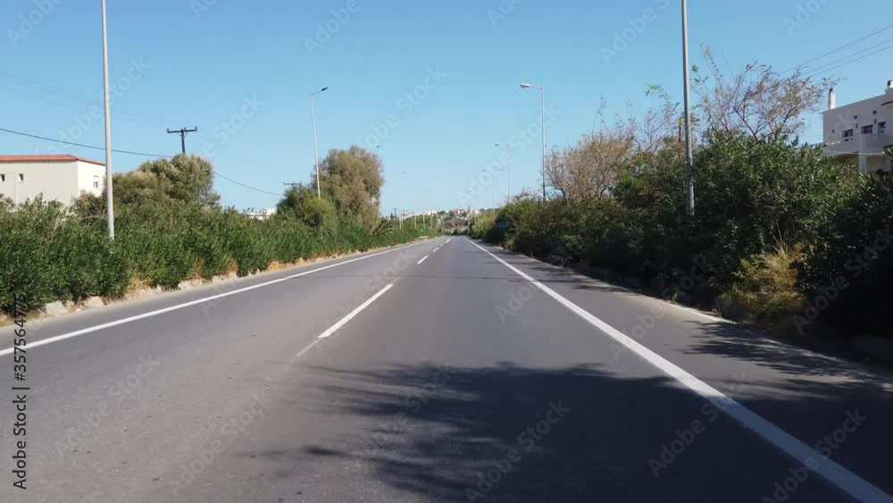 Greek landscape driving a car on an asphalt road. Greek landscape driving a car on an asphalt road.
