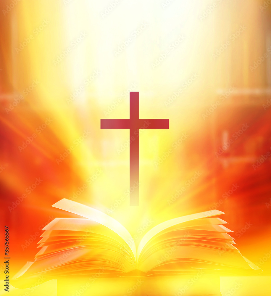 The Christian Cross appears bright, floating on the Bible books in white light and fantasy, with shining magic as hope, love and freedom as the doctrine of Jesus.
