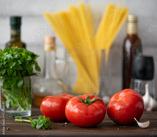 ingredients for pasta with tomatoes, basil and garlic