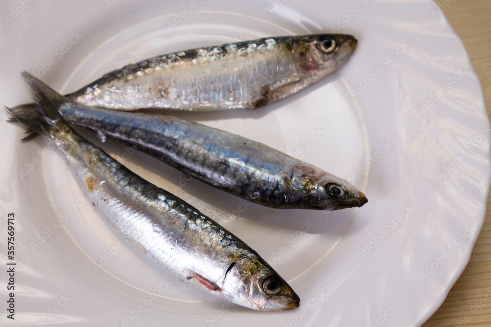 plate of fresh sardines on the plate