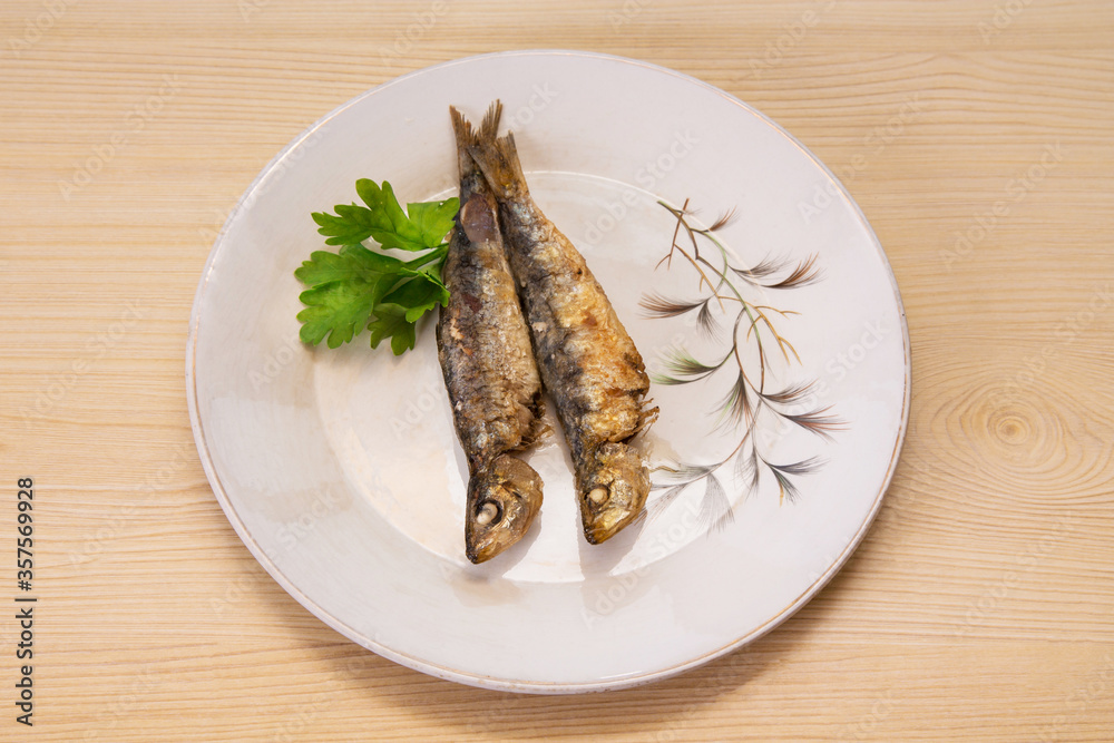 grilled fish, sardines or anchovies with parsley grilled fish, sardines or anchovies with parsley
