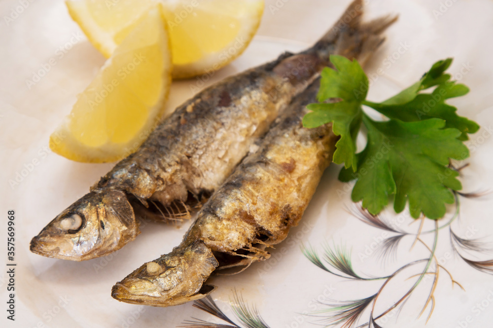 grilled fish, sardines or anchovies with parsley grilled fish, sardines or anchovies with parsley
