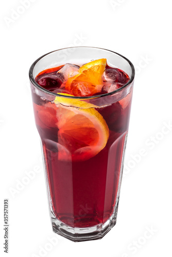 glass of red refreshing lemonade. Summer drink with sliced lemon, cherry and ice cubes isolated on a white background