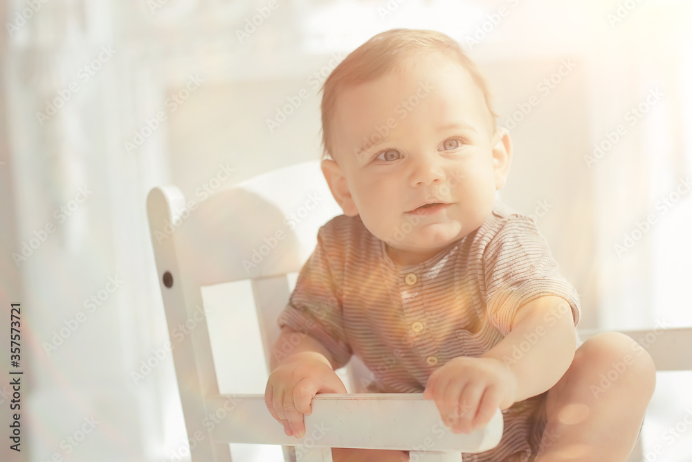 cheerful healthy baby smiling / portrait of a small child, boy little son cheerful health