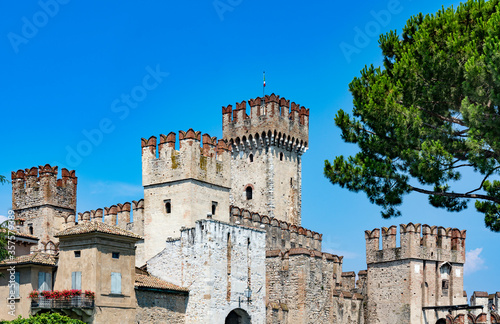 Sirmione, Italy - July 14, 2018: Scaliger Castle (13th century) in Sirmione on Garda lake in Italy