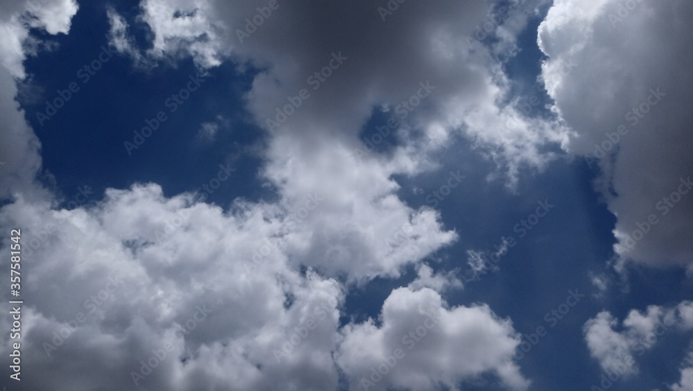 Fototapeta premium beautiful white clouds in sky. Abstract cloudscape wallpaper.