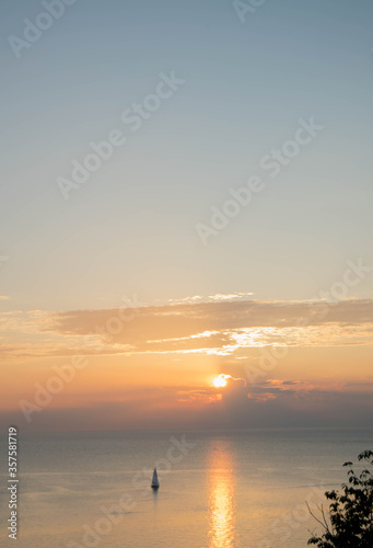 Sunset with clouds over the sea © Rok