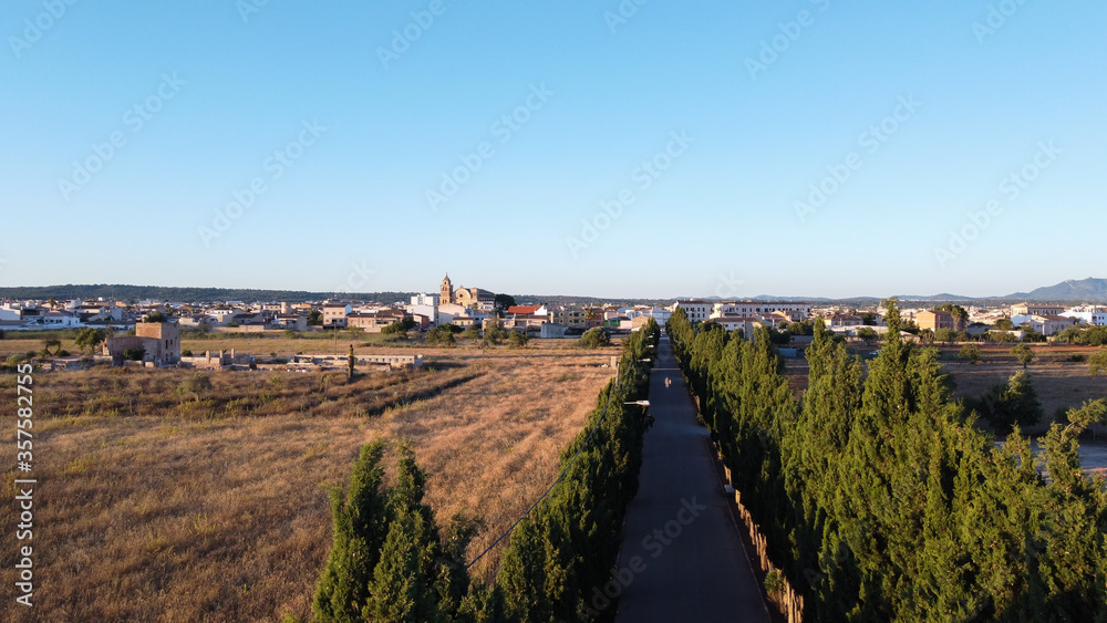 Obraz premium Aerial view of the village of Campos at sunset on a sunny day