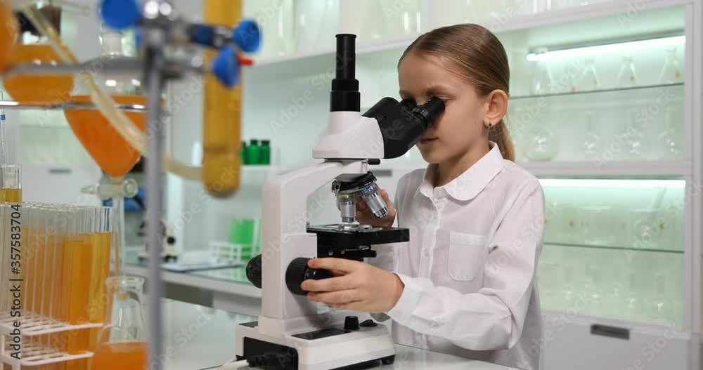 Kid Using Microscope in School Chemistry Laboratory, Student Child Studying in School Class, Girl Learning Microbiology Experiments in Classroom, Children Education, Educative View Kid Using Microscope in School Chemistry Laboratory, Student Child Studying in School Class, Girl Learning Microbiology Experiments in Classroom, Children Education, Educative View