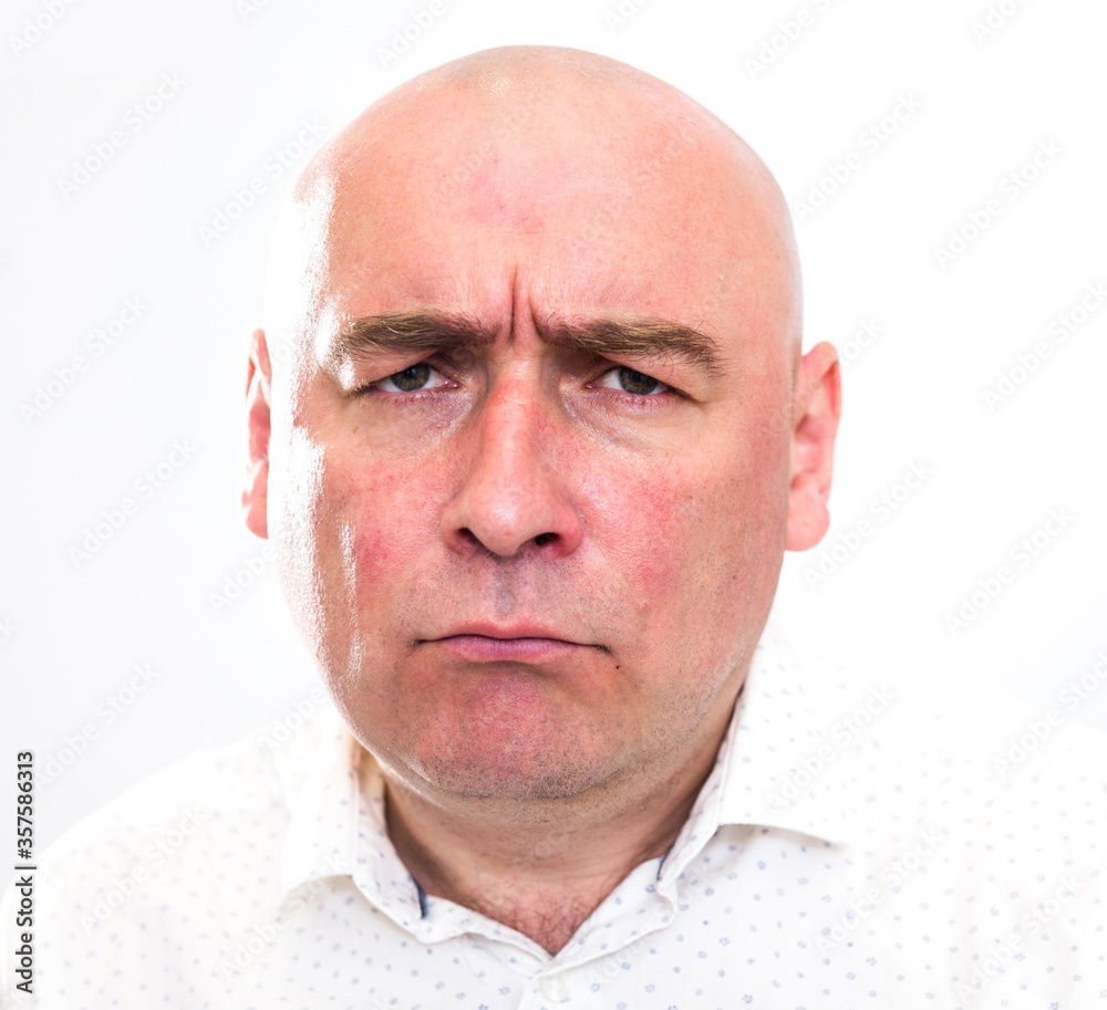 Fototapeta premium portrait of bald adult mature man with emotions on white background
