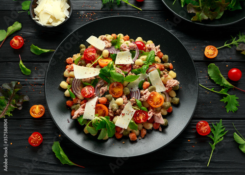 Mini potato gnocchi tricolour with tomato, spinach, Seasonal salad leaves and parmesan cheese
