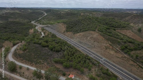 Aerial drone view of Highway road in Odeleite Dam reservoir - Algarve, Portugal photo