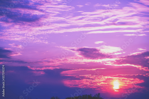 Colorful cloudy sky at sunset. Gradient color. Sky texture. Abstract nature background