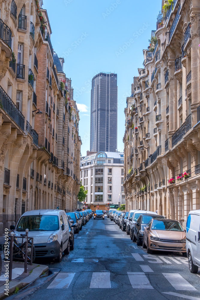 Montparnasse Tower at the End of a Narrow Parisian Street with Cars