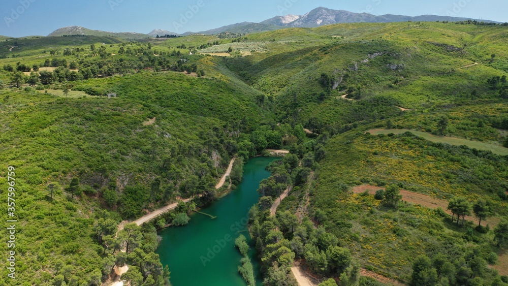 Aerial drone panoramic photo of beautiful nature in artificial lake and dam of Marathonas or Marathon that feeds drinking water supply to Athens, Attica, Greece