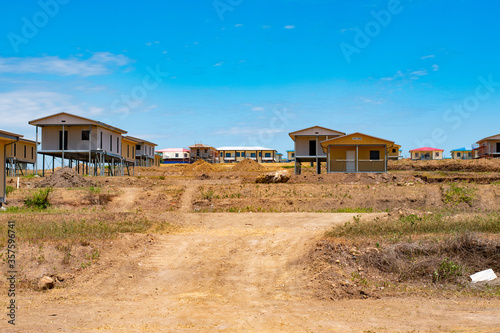 Papua New Guinea  Port Moresby  7 Mile Kennedy Estate. Chinese builders manufacture new houses  fast building construction.  New houses for local community  Chinese project. 