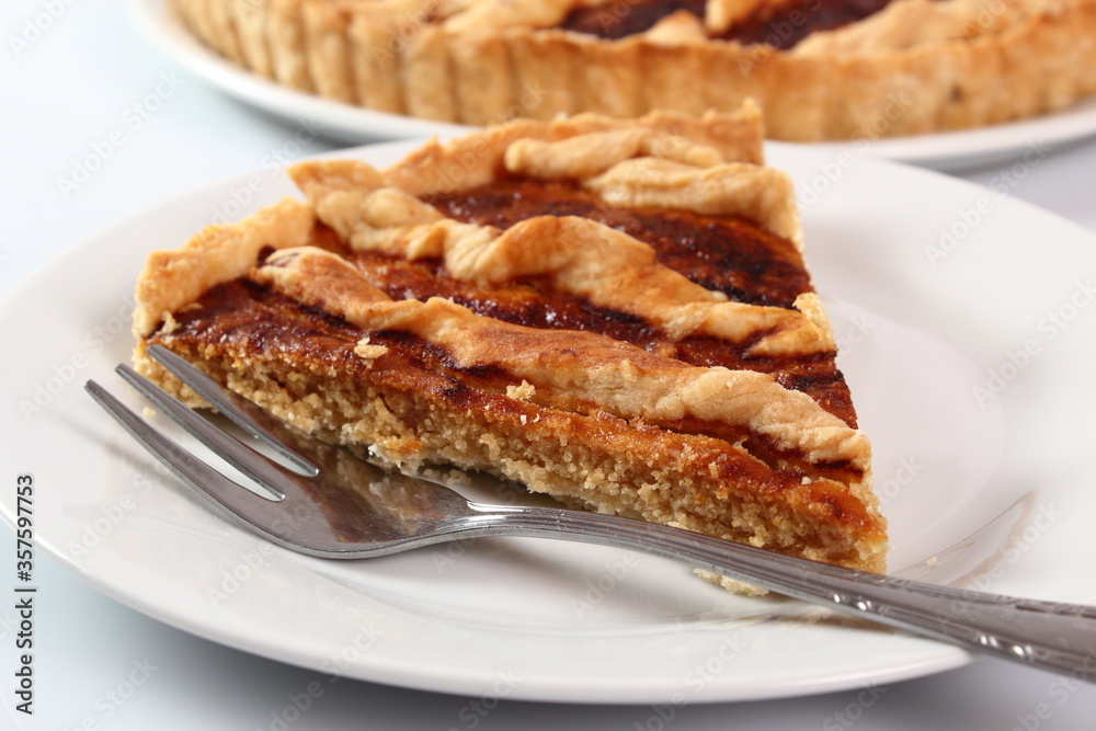 Shoofly Tart with Golden Syrup Filling. Isolated on white background.