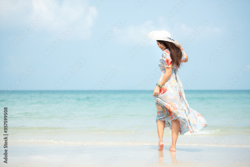 Summer vacations. Lifestyle woman relax and chill on beach