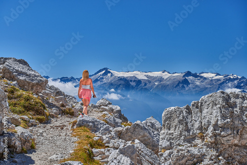 Women Travel nature in the mountains,Woman watching the dolomiti mountains