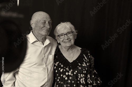 Portrait of senior elderly couple demonstrate their true love to each other, have good relationships, experienced many positive and negative events in life together, being inseparable and supportive.