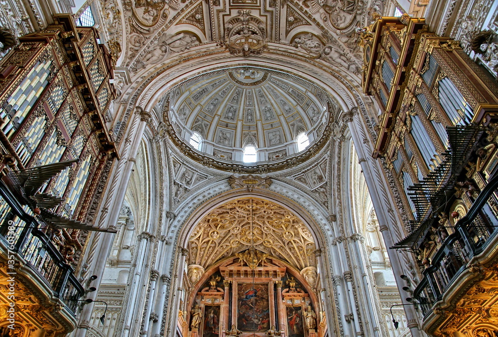  Interior view of La Mezquita Cathedral in Cordoba Spain. The cathedral was built inside of the former Great Mosque. Popular tourist destination in Spain.