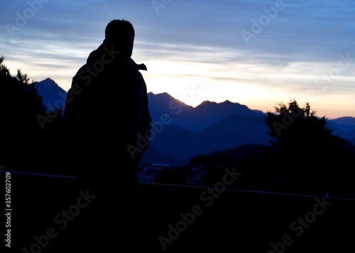 silhouette of a man on the top of mountain © Himalayan Gypsy
