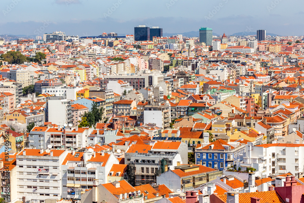View to downtown of Lisbon with miltiple streets and houses and business buildings in a background, Portugal