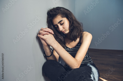 praying woman in the room