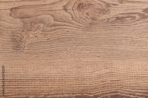 Oak toned light brown wood texture. Rough structured surface.