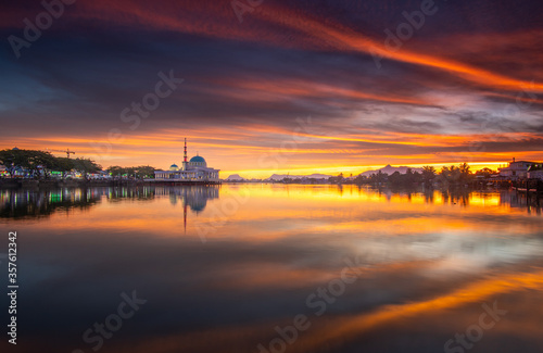 sunset reflection with mosque