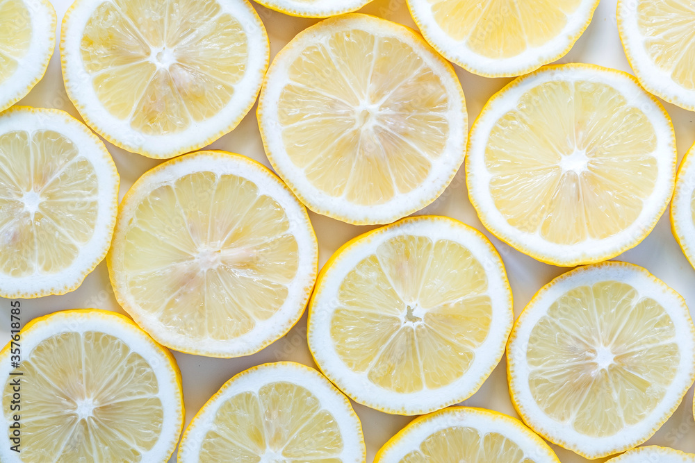 Collection of fresh yellow lemons slice isolated on white background.
