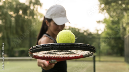  girl holds racket and tennis ball © Ирина Бельдий