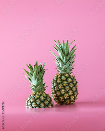 Pineapple fruit isolated on pink background. Healthy lifestyle concept.