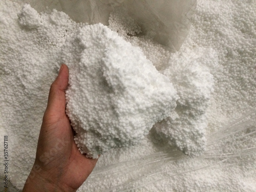 Urea chemical fertilizer, white foam granules, agglomerate In the hands of farmers