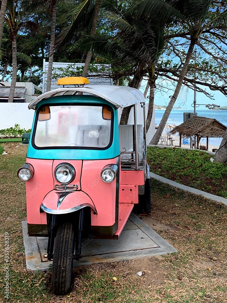 old vintage car in the park with beach 