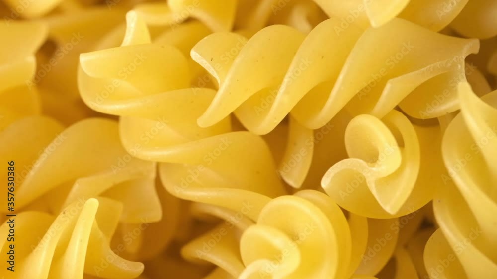 Grocery video background top-quality wheat flour pasta close-up rotates in front of the camera macro shooting Grocery video background top-quality wheat flour pasta close-up rotates in front of the camera macro shooting