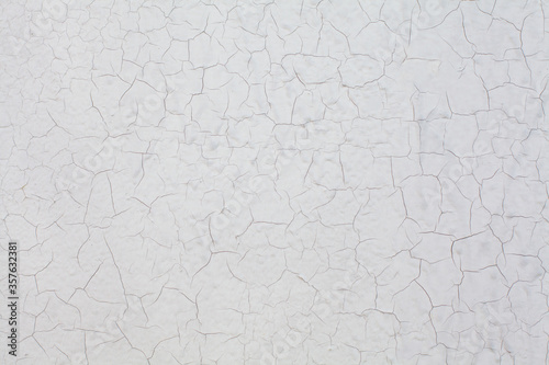 Cracked grunge concrete wall texture white background