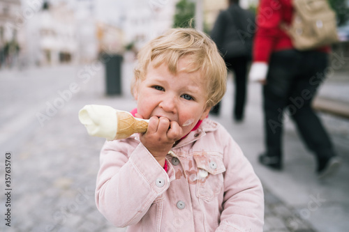 Portrait of little girl with ice cream