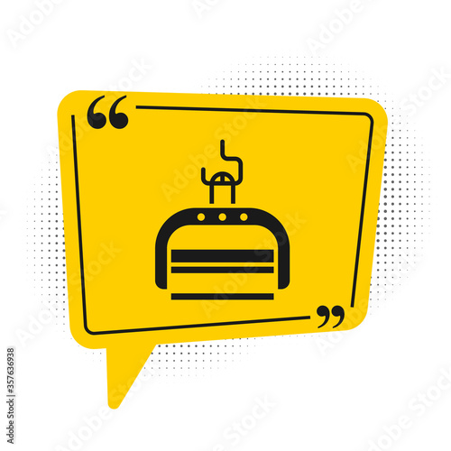 Black Ski lift icon isolated on white background. Yellow speech bubble symbol. Vector Illustration.
