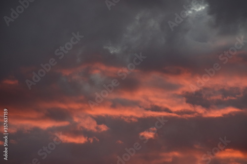 red sky with clouds © ian