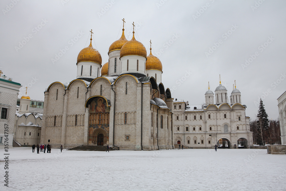 Moscow / Russia - February 17,  2017: Dormition Cathedral where is famous for tourist and located in Kremlin Palace with beautiful gold dome.