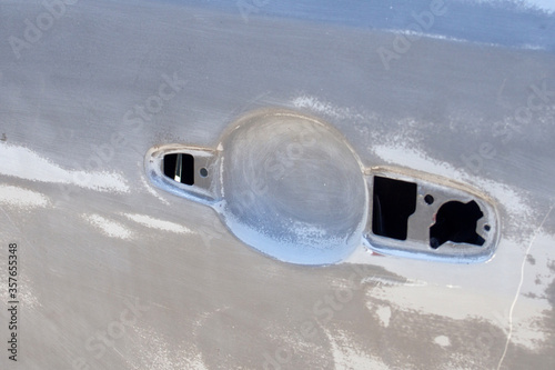 preparation of the car door for painting, the removed handle on the car door