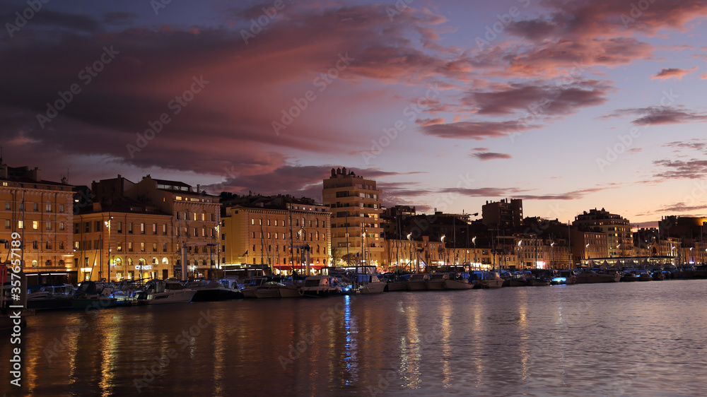 Sunset on the old harbor of Marseille, France