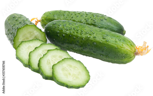 sliced and whole fresh cucumbers isilated on white background