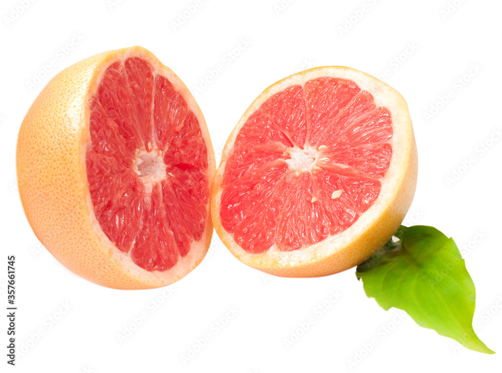 sliced grapefruit with green leaves isolated on white background sliced grapefruit with green leaves isolated on white background