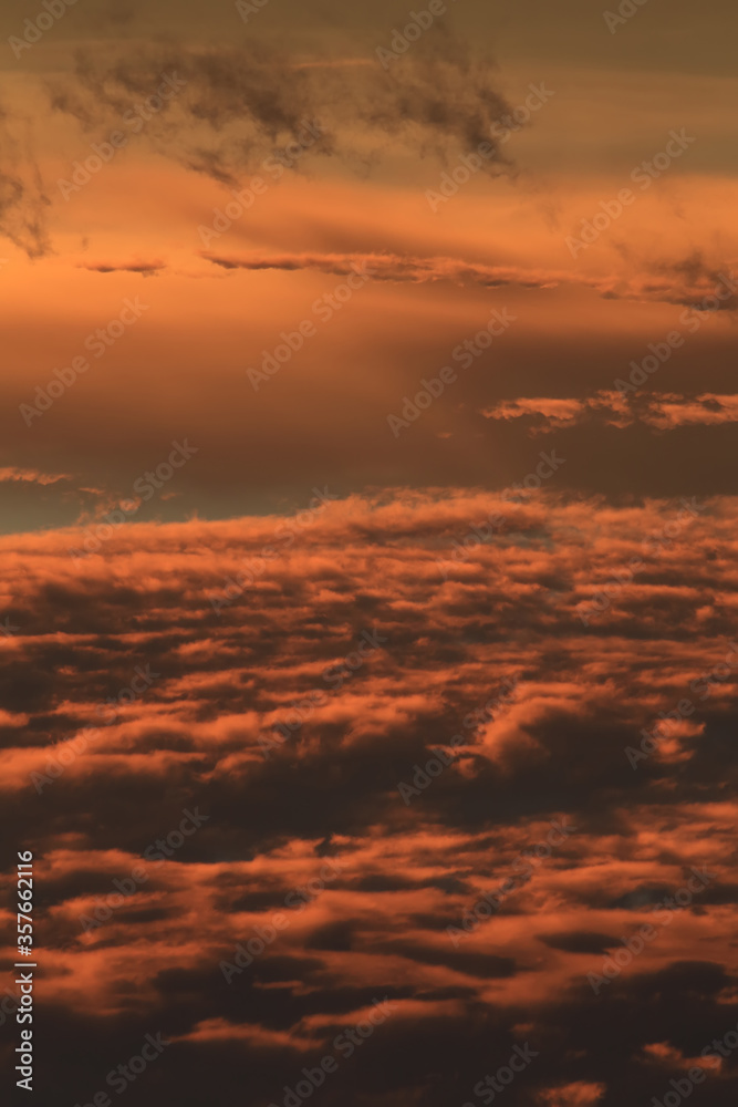 view of sunset clouds from above