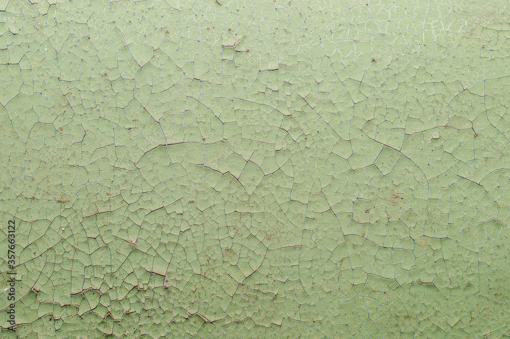Old painted wall with cracked paint Old painted wall with cracked paint
